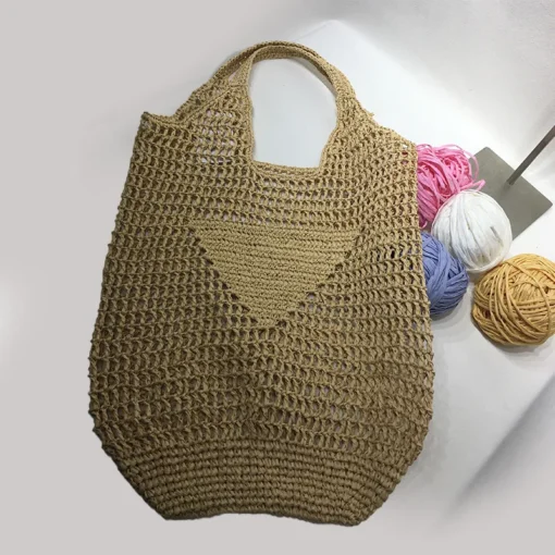 Designers hollowed out hand-woven paper rope bags one-shouldered ladies' hand-held craft bags and summer beach vacations